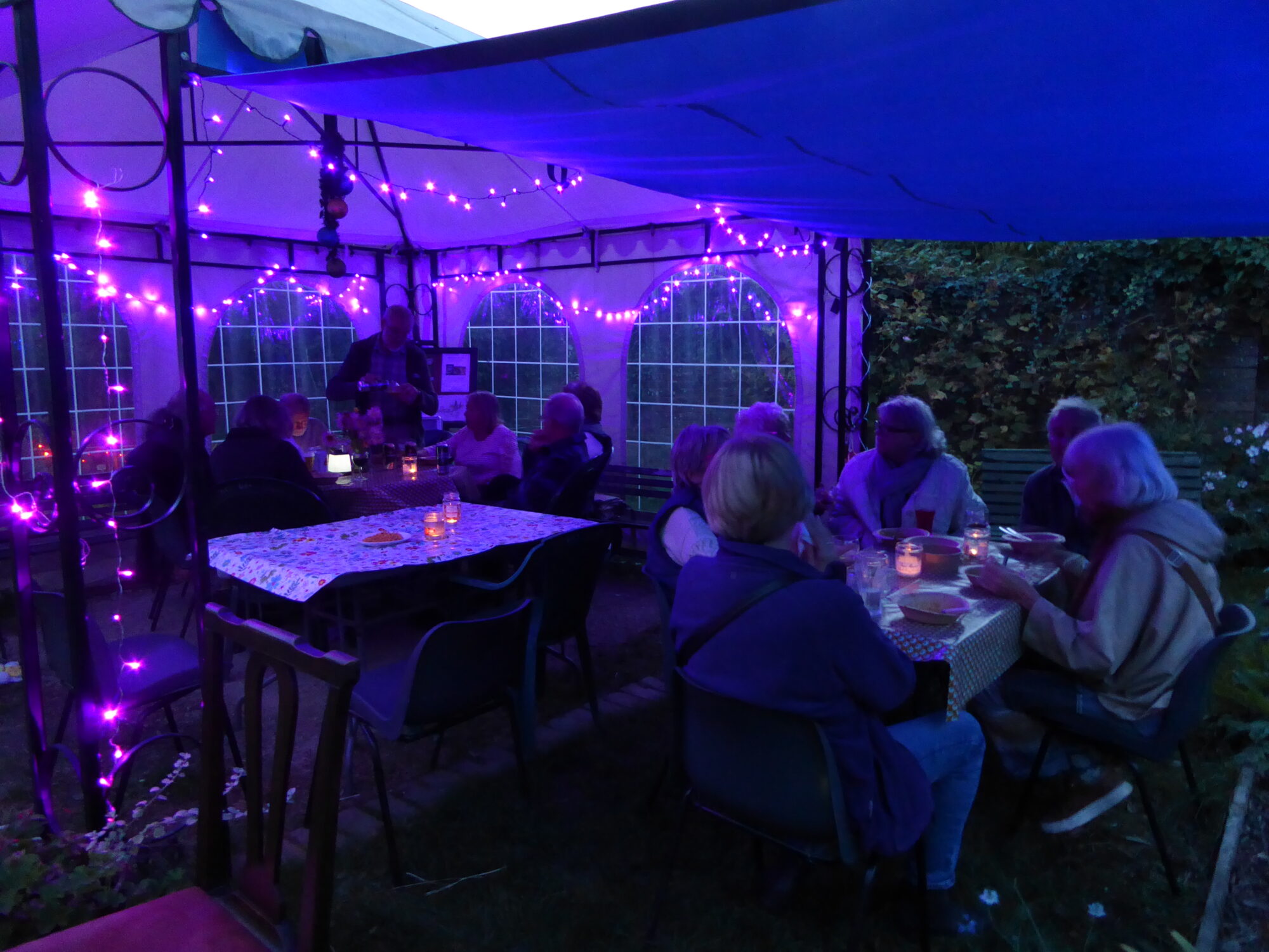 After dark in the Victorian Garden, atmospheric lighting under the new awning